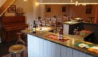 Hoeve in Herresbach grote ontspanningsruimte met keuken