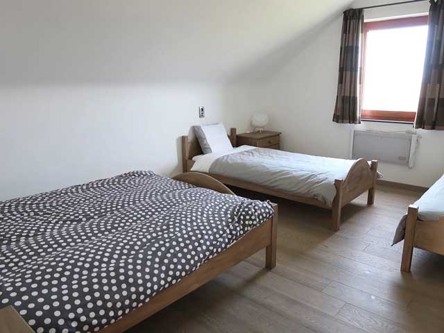 Villa in Érezée slaapkamer met 2 persoons bed • 2x 1-persoonsbed